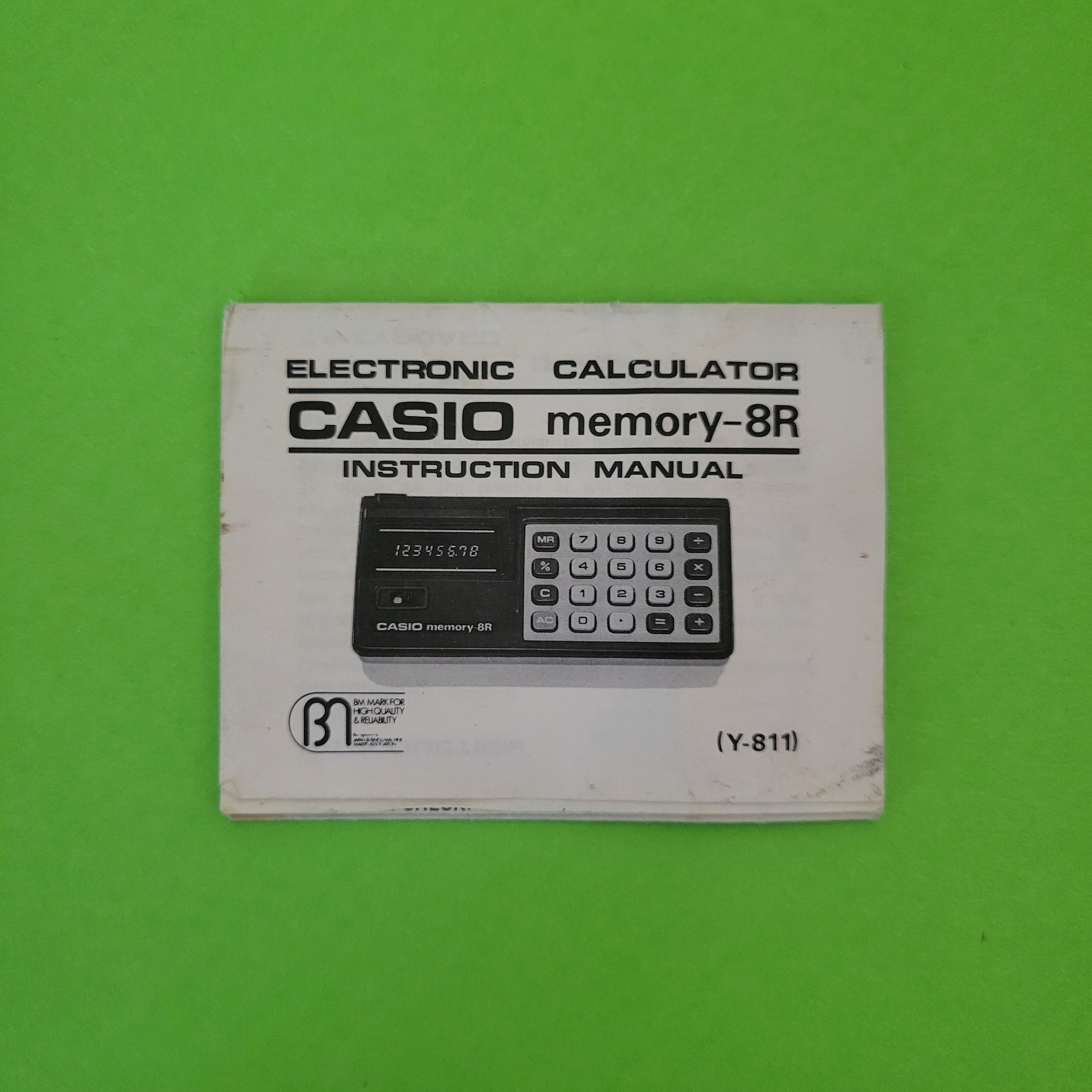An image of the instructions of a Casio Memory-8R Four Function + calculator